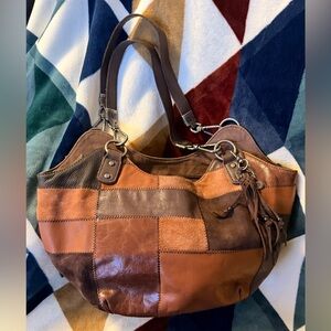 The Sak Indio Satchel in brown patchwork leather